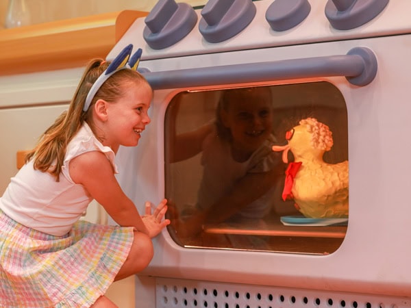 The iconic Women's Weekly duck cake in the oven at Bluey's World in Brisbane