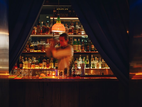 a bartender mixing drinks at Bombabar, Melbourne CBD