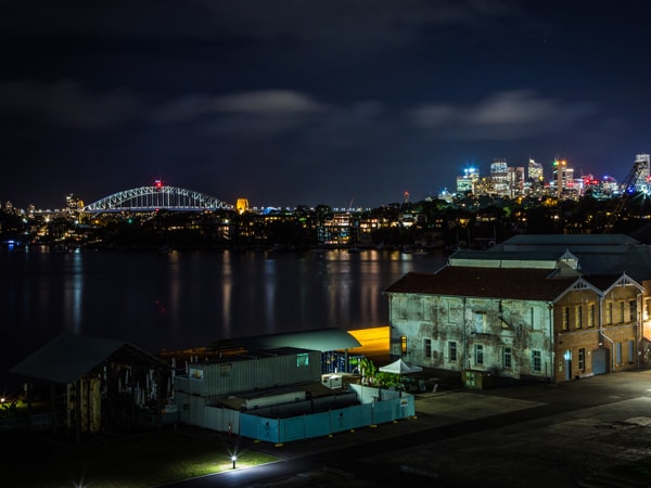 the view of the Sydney skyline at night as seen from Cockatoo Island, Sydney