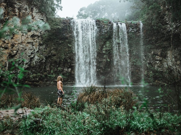 a man standing at Dangar Falls, Dorrigo National Park, NSW