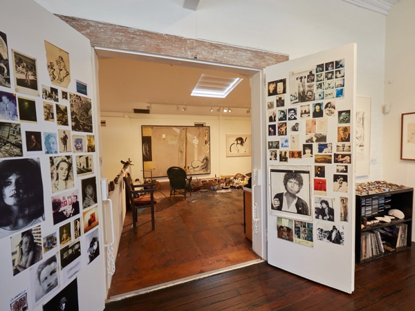 walls filled with photographs at Brett Whiteley Studio