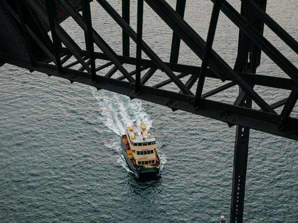 the Friendship Ferry passing under Sydney Harbour Bridge