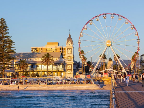 a ferris wheel on Glenelg Beach