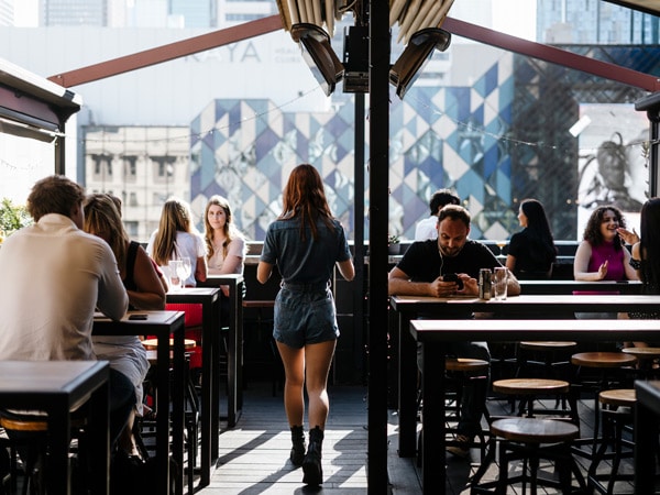 guests sitting at the rooftop bar in Goldilocks Bar, Melbourne CBD