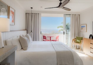 a chic bedroom at Hillcrest Merimbula