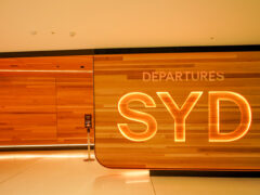 Sydney Airport international terminal departure sign
