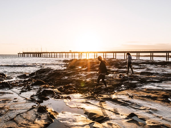 walking along Lorne Pier at sunrise