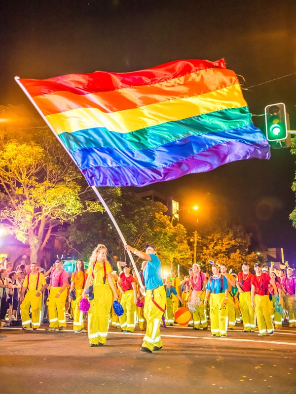 a huge LGBTQI+ flag at the Sydney Gay and Lesbian Mardi Gras parade
