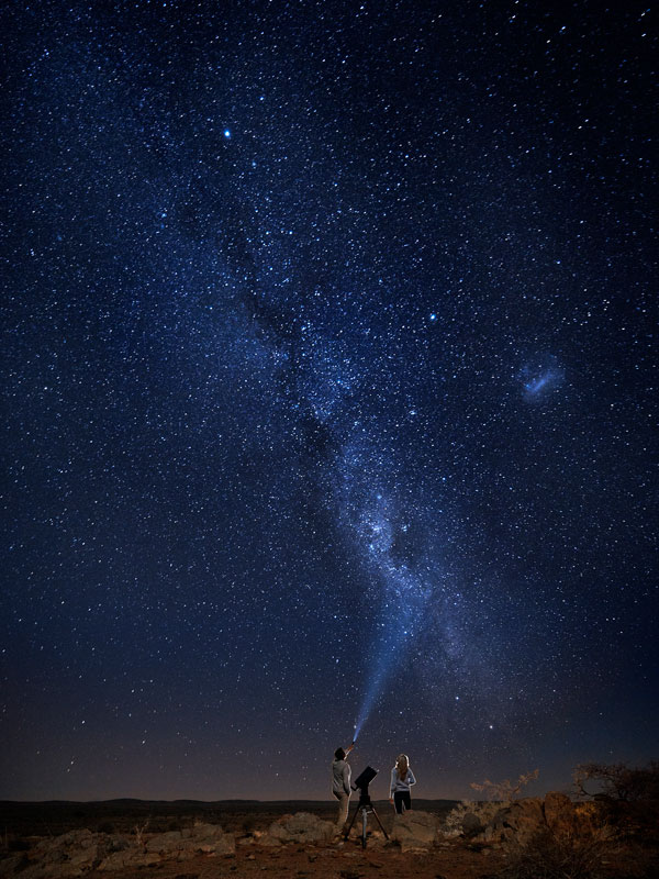 a couple stargazing at Outback Astronomy, Broken Hill, NSW