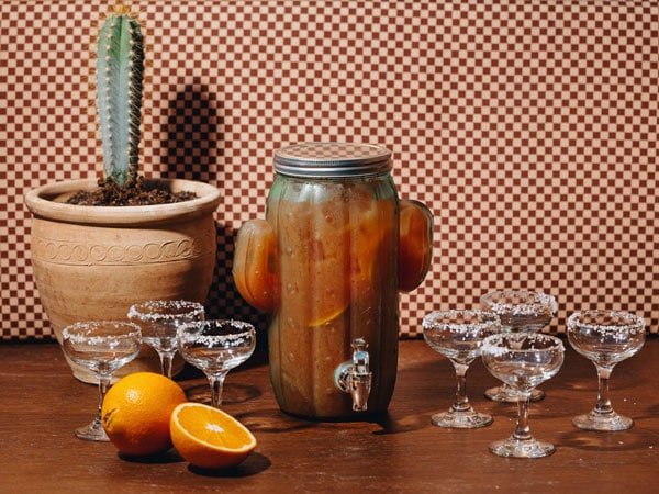 orange slices and glasses o wine with cactus plants at Full Moon Fever, Abbotsford