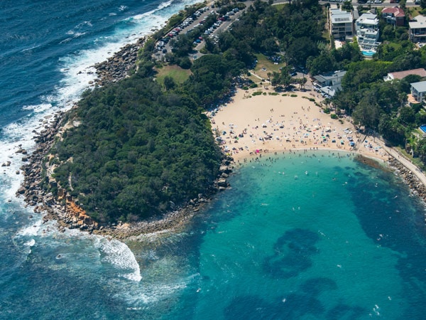 an aerial view of crowds enjoying Australia Day 2019 on Shelly Beach