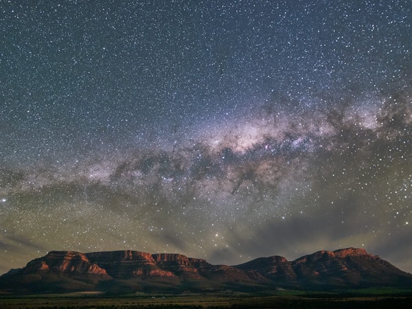 a night sky filled with stars at Wilpena Pound