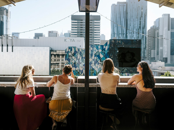 four women sitting at Goldilocks Bar, Melbourne