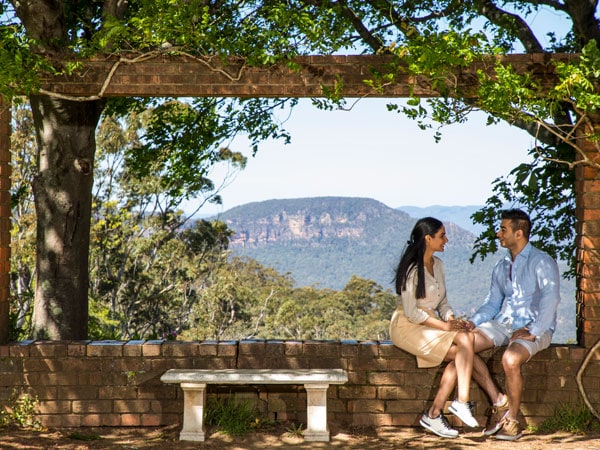 a couple enjoying a visit to the scenic Everglades Historic House and Gardens, Leura in the Blue Mountains