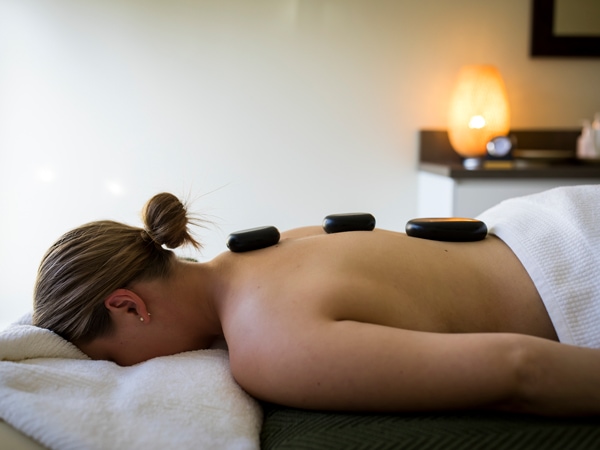 a woman enjoying a spa treatment at Ubika Day Spa inside the Fairmont Resort & Spa, Leura in the Blue Mountains