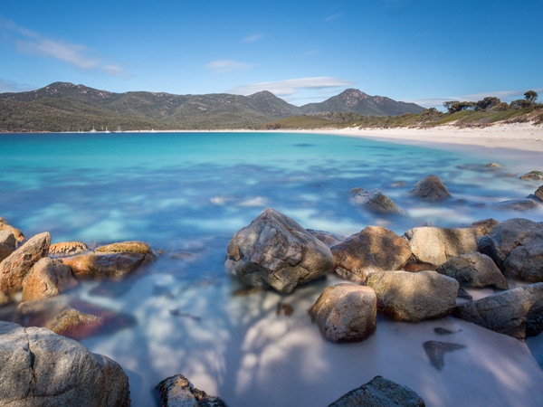 the rocky shore of Wineglass Bay