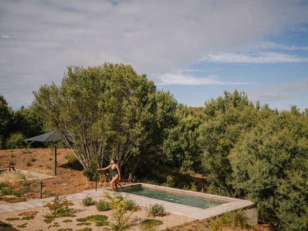 a woman came out from the pool at Alba after taking a dip