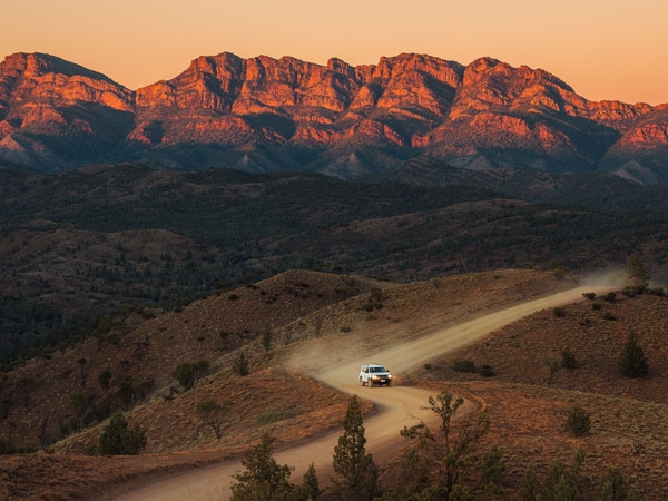 an aerial view of a 4WD driving along Bunyeroo Valley, Flinders Ranges
