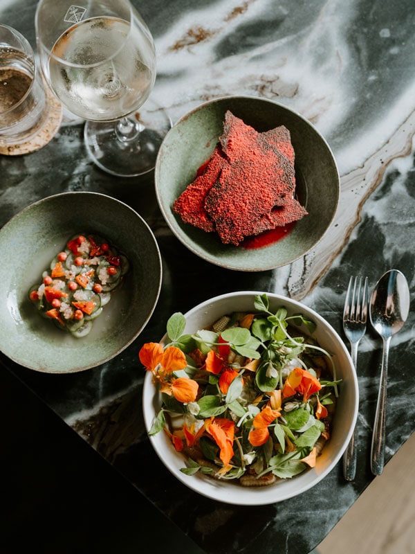 a table-top view of dishes at Freyja