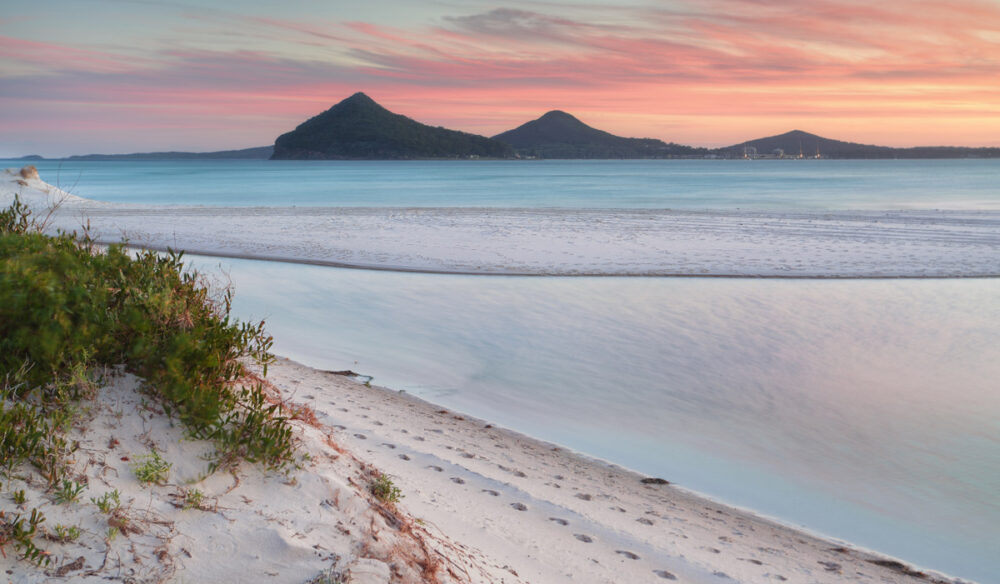 Windy sunset from Winda Woppa Reserve, overlooking Wind Woppa Lagoon and views to Mt Tomaree, Stephens Peak and Shoal Bay.