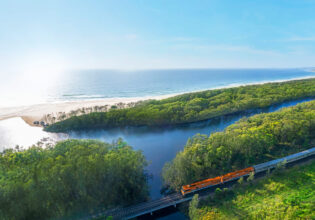 an aerial view of the Great Southern train passing through Coffs Harbour