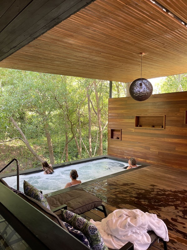 people enjoying a dip in the wellness pool at Hepburn Bathhouse