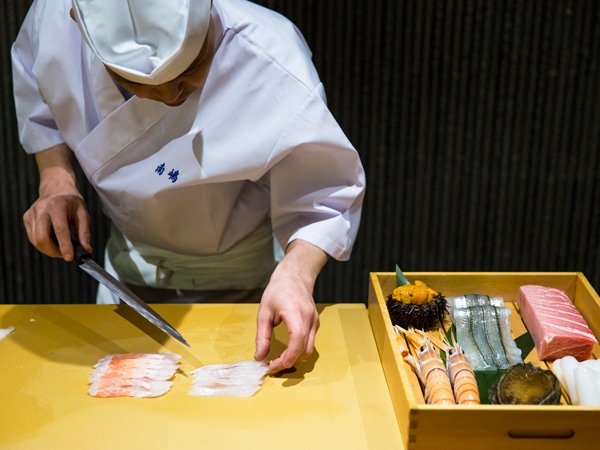 sushi master Koichi Minamishima doing meal preparations at Minamishima, Richmond