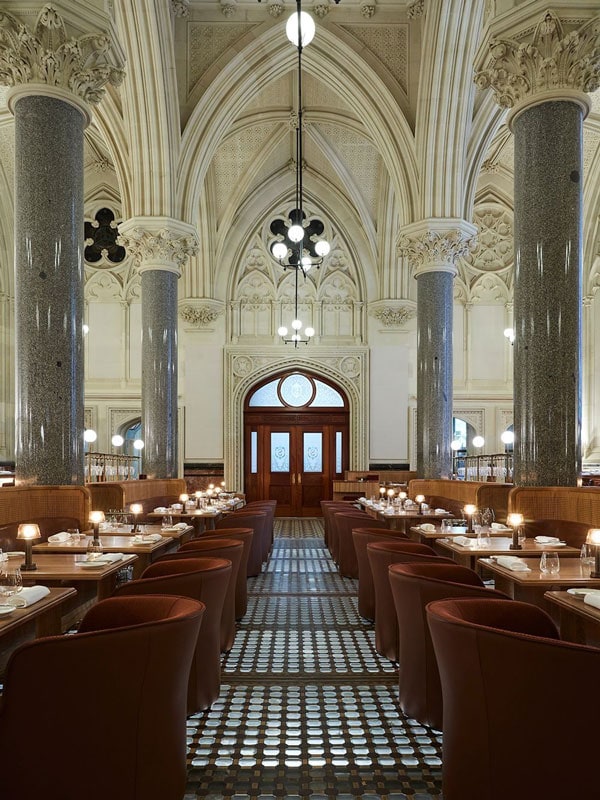 a cathedral-style dining interior at Reine and La Rue, CBD