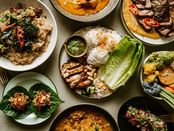 an array of dishes at on the table at Thai Tide, CBD