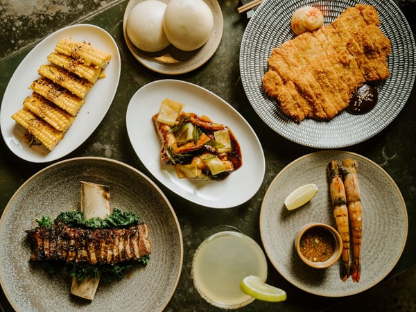 a table-top view of food at Yan, South Yarra