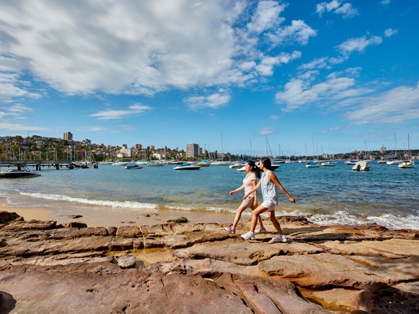 friends enjoying a walk along Forty Baskets Beach,Balgowlah