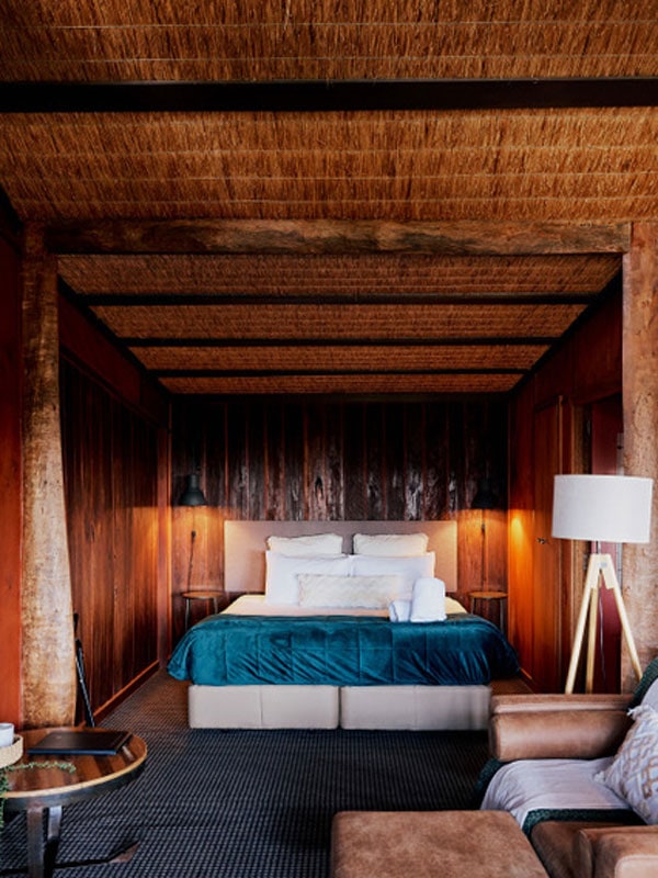 a rustic bedroom at Seclusions Blue Mountains