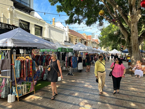 people shopping at the Manly weekend market