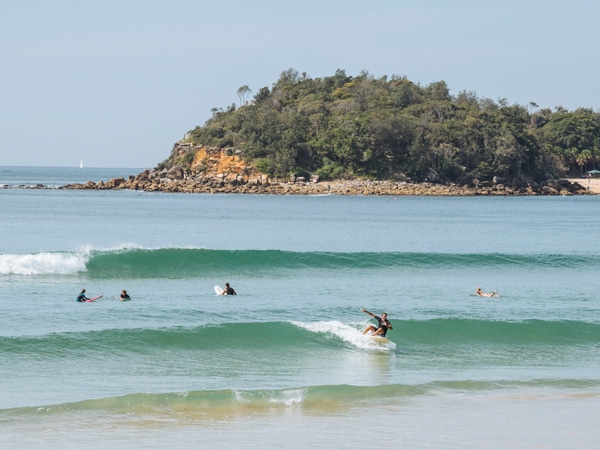 surfing at Manly Beach