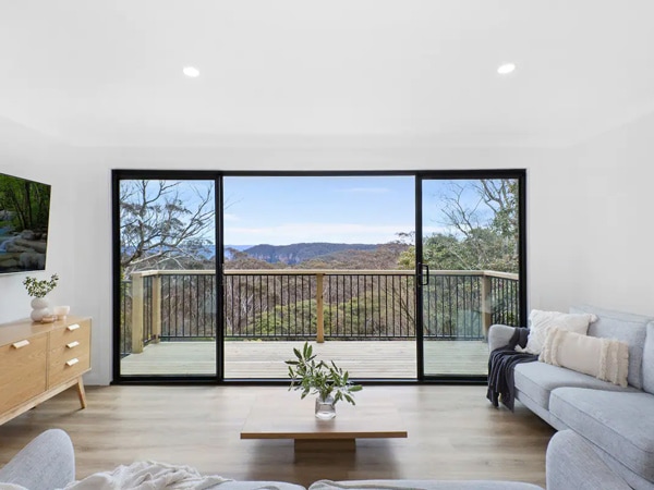 View from the lounge out onto the deck at Megalong Lookout Cottage