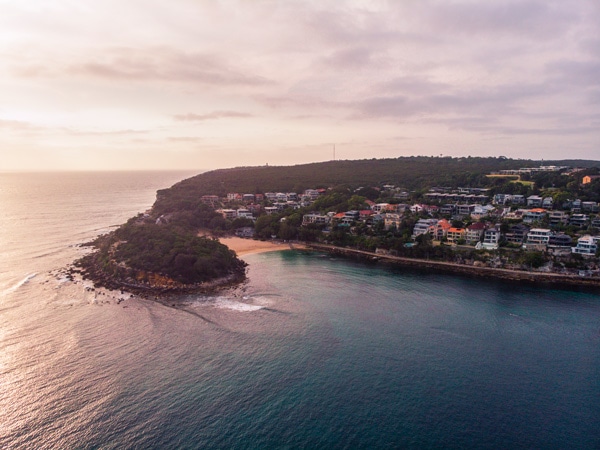 an aerial view of the Shelly Beach and the Cabbage TreeBay Aquatic Reserve, Manly
