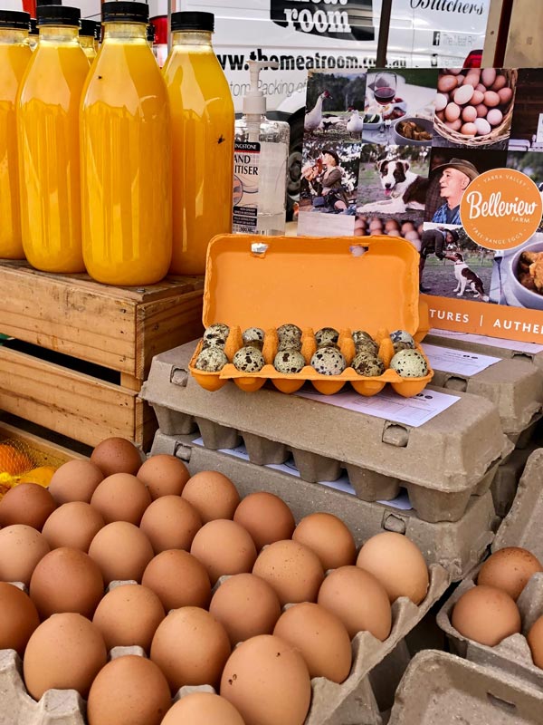 Fresh eggs and orange juice on sale at SloFO Markets