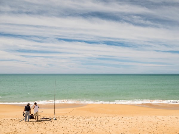 people relaxing on Ninety Mile Beach