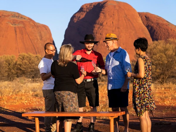 a group of travellers at Kata Tjuta tour with AAT Kings