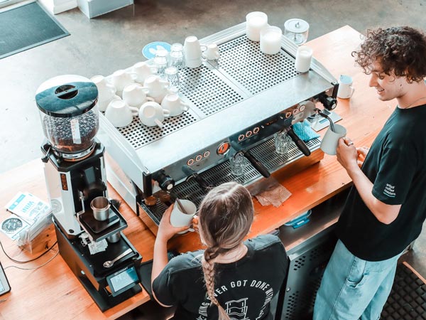 Baristas at Artisti Coffee Roastery