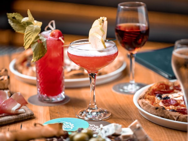 a close-up shot of food and drinks on the table at Cloudland, Fortitude Valley