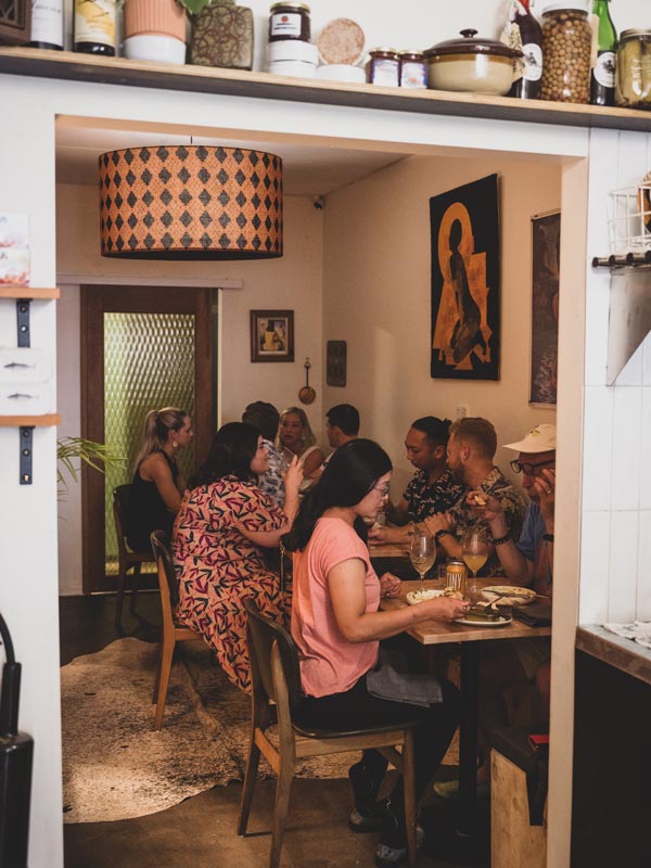 a group of people dining at Hey Rosey in Orange