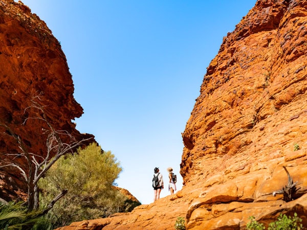 exploring across the rock formations in Uluru with Intrepid Travel