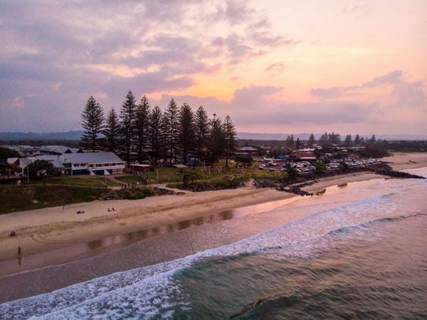 Sun setting over Main Beach, Byron Bay.