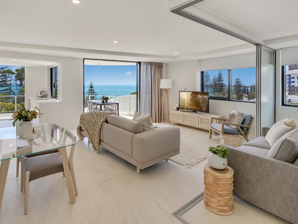 a two-bedroom apartment with living room overlooking the ocean at Breeze Mooloolaba Beach