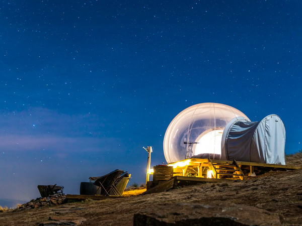 the Bubbletent Australia luxury glamping dome under the night sky in the Capertee Valley