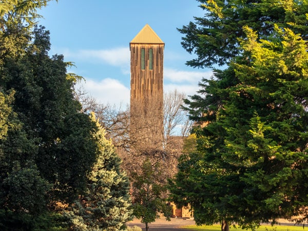 the tall church tower against a blue sky in Wangaratta