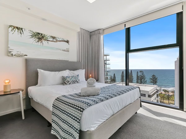 the bedroom at First Light Mooloolaba Bedroom with floor-to-ceiling windows