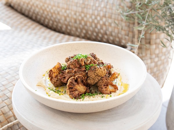 a plate of fried cauliflower at Sunsets Rooftop, Brisbane