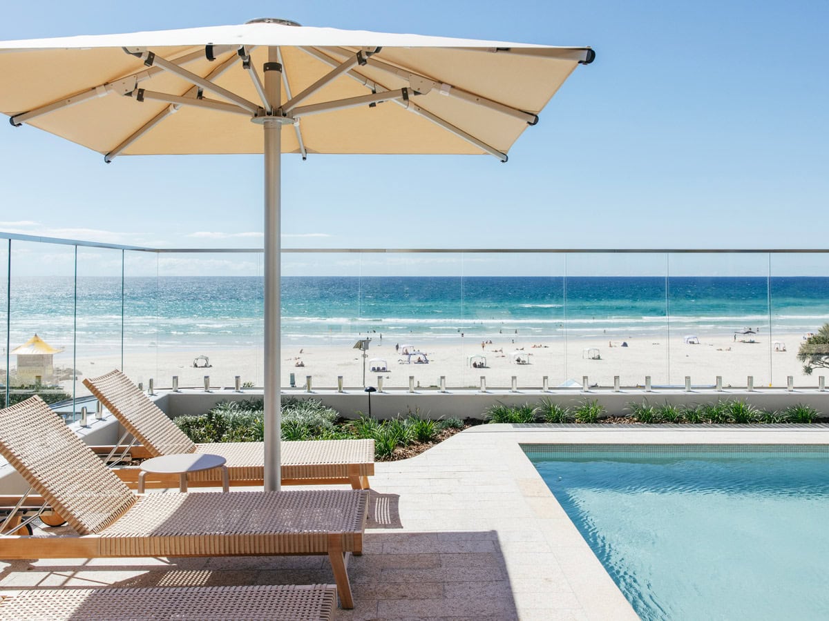 sun loungers by the pool at Kirra Point